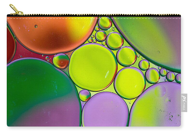 Oil Zip Pouch featuring the photograph Oil and Water Z by Rebecca Cozart