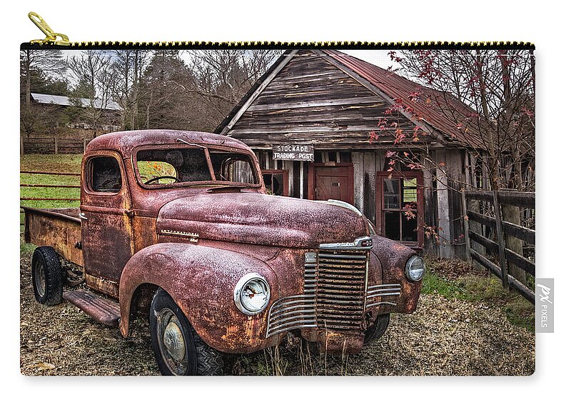 1930s Zip Pouch featuring the photograph Old and Rusty by Debra and Dave Vanderlaan
