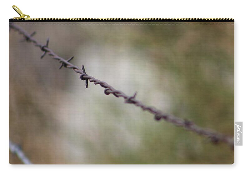 Golden Zip Pouch featuring the photograph Old Barbed Wire in Autumn Tones - Portrait by Colleen Cornelius