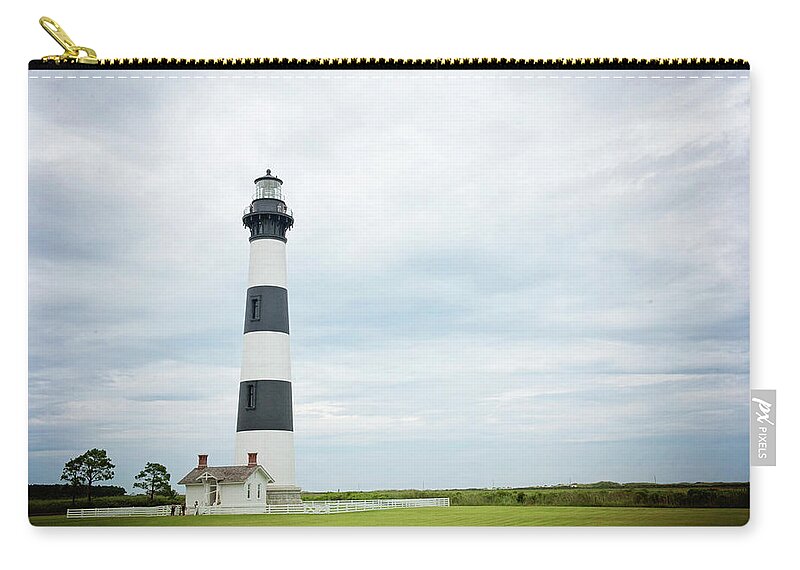 Lighthouse Zip Pouch featuring the photograph Old Bodie by Kelley Nelson