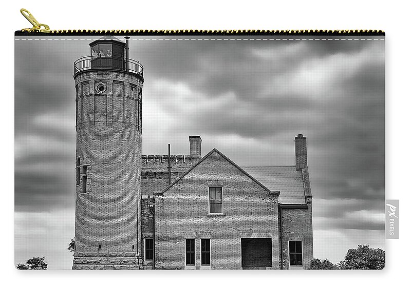 Light House Zip Pouch featuring the photograph Old Mackinac Point Light Gray Day BW by Mary Bedy