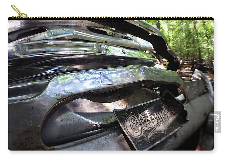 Oldsmobile Zip Pouch featuring the photograph Oldsmobile Bumper Detail by Matthew Mezo