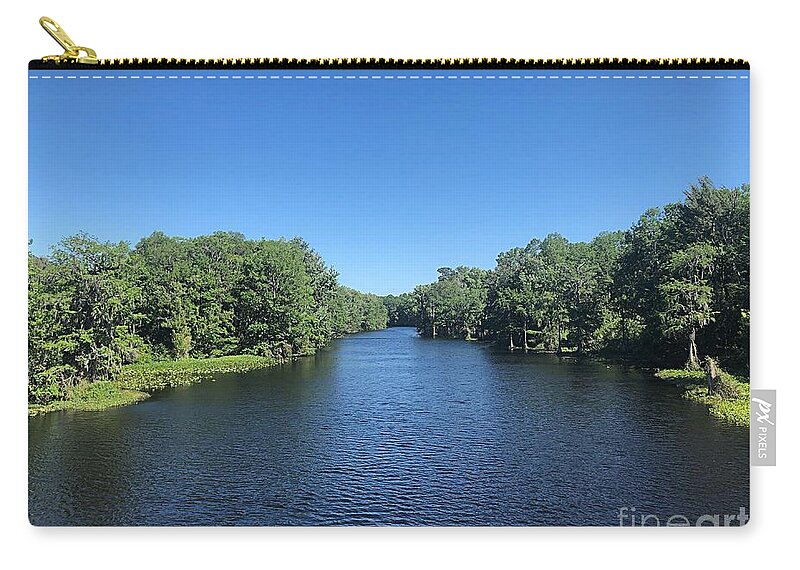 On The River Zip Pouch featuring the photograph On The River by Carol Riddle