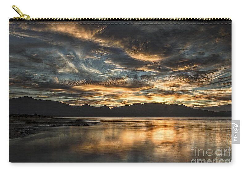 On The Wings Of The Night Zip Pouch featuring the photograph On The Wings Of The Night by Mitch Shindelbower