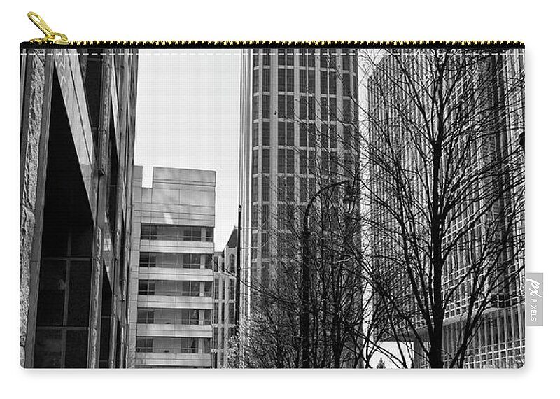 Midtown Atlanta Zip Pouch featuring the photograph One Atlantic Center in Black and White by Jill Lang