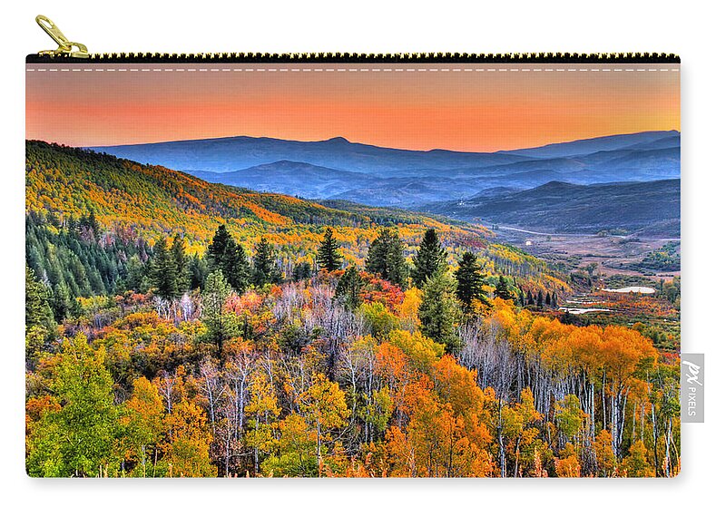 Mountain Zip Pouch featuring the photograph Orange Glow by Scott Mahon