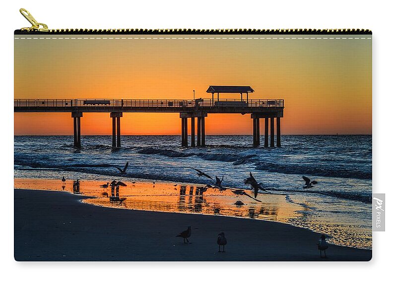 Alabama Zip Pouch featuring the photograph Orange in the Morning in Orange Beach by Michael Thomas