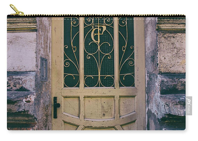 Gate Zip Pouch featuring the photograph Ornamented doors in light brown color by Jaroslaw Blaminsky