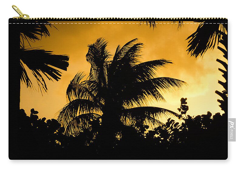 Sunset Zip Pouch featuring the photograph Palm trees in sunset by Wolfgang Stocker