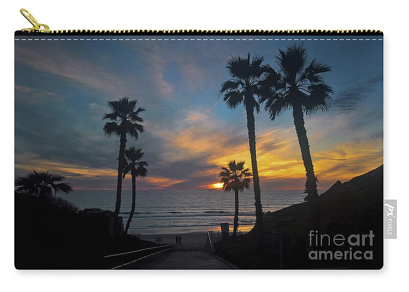 Sunset Zip Pouch featuring the photograph Palms at sunset by Agnes Caruso