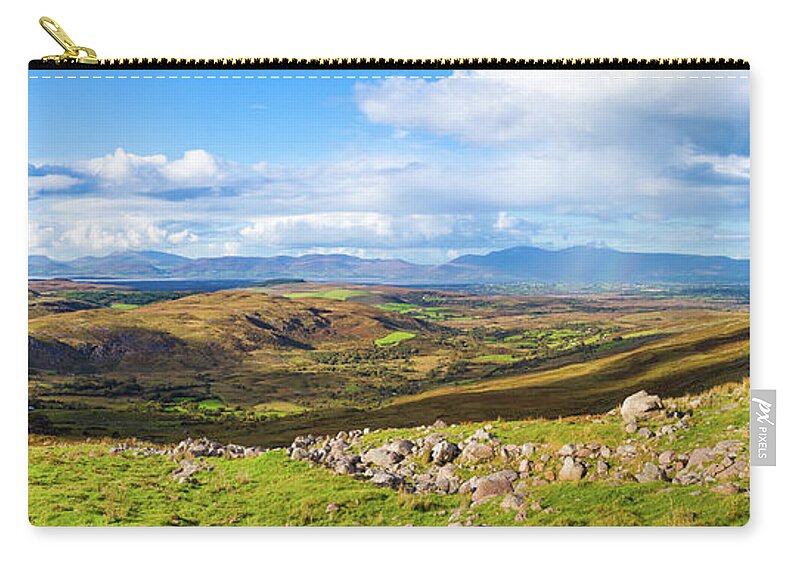 Blue Zip Pouch featuring the photograph Panorama of a colourful undulating Irish landscape in Kerry by Semmick Photo