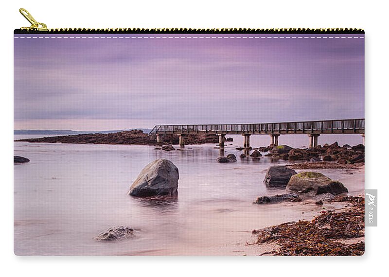 Sunset Zip Pouch featuring the photograph Pans Rocks Beach by David Lichtneker