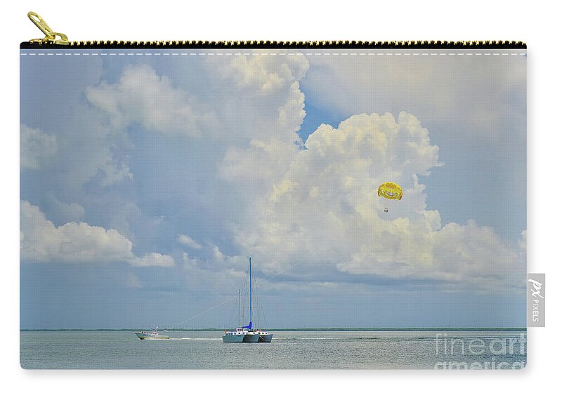 Parasailing Zip Pouch featuring the photograph Parasailing in Key Largo by Olga Hamilton