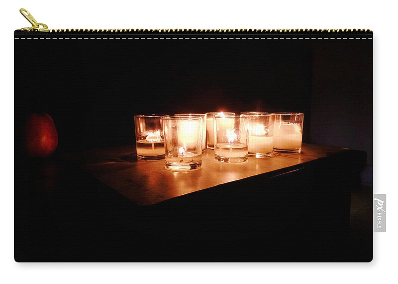 Candle Light Zip Pouch featuring the photograph Peace On A Stormy Night by Zinvolle Art