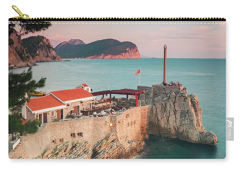 Sunset Zip Pouch featuring the photograph Petrovac fortress Montenegro by Sophie McAulay