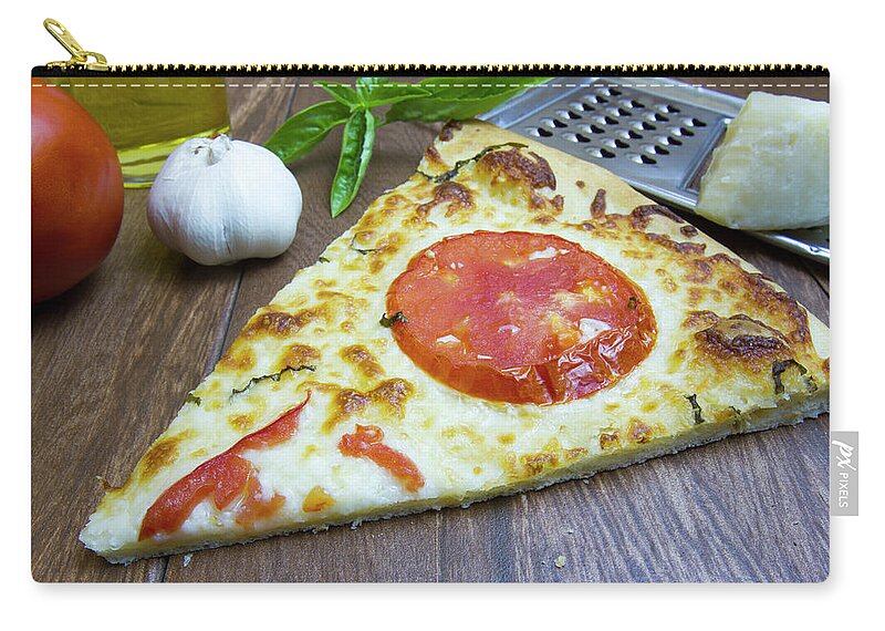 Baked Zip Pouch featuring the photograph Piece of Margarita pizza with fresh ingredients by Karen Foley