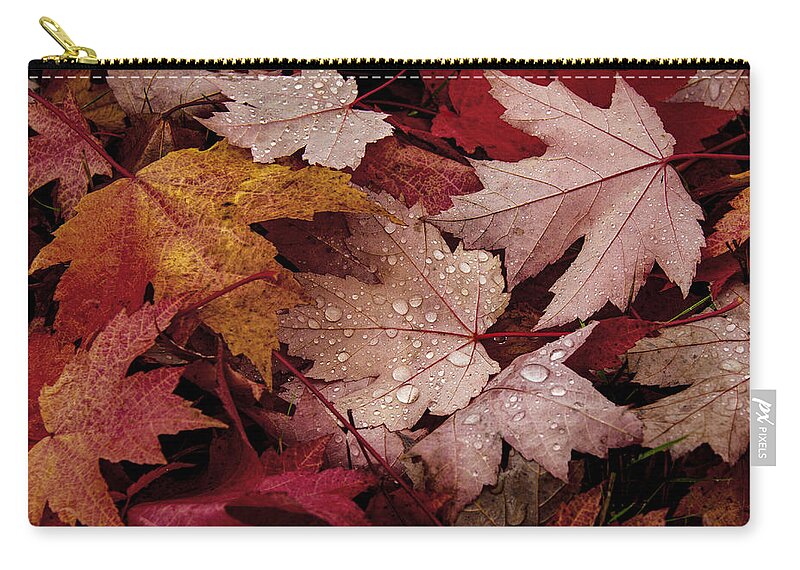 Color Zip Pouch featuring the photograph Pile of Leaves by Jean Noren