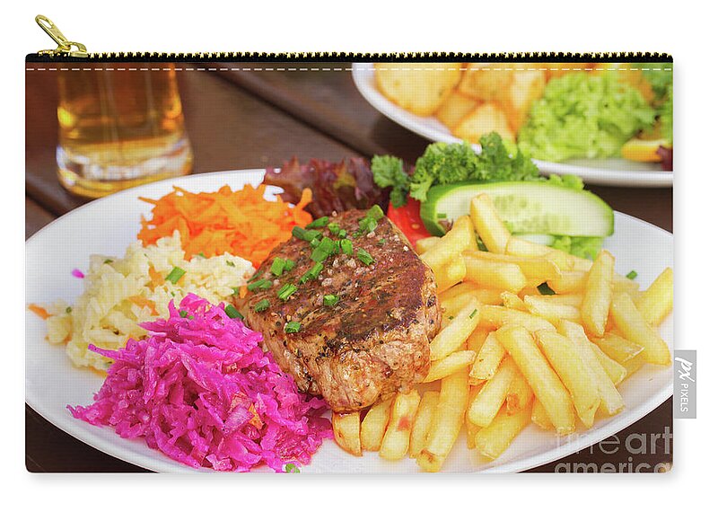 Steak Carry-all Pouch featuring the photograph Plate of Steak with Garnish by Anastasy Yarmolovich