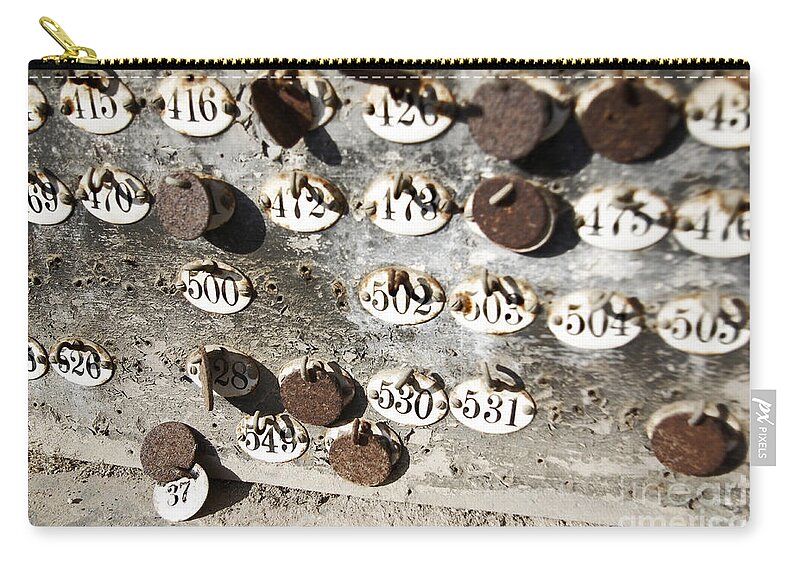 Abandoned Zip Pouch featuring the photograph Plates with Numbers II by Carlos Caetano