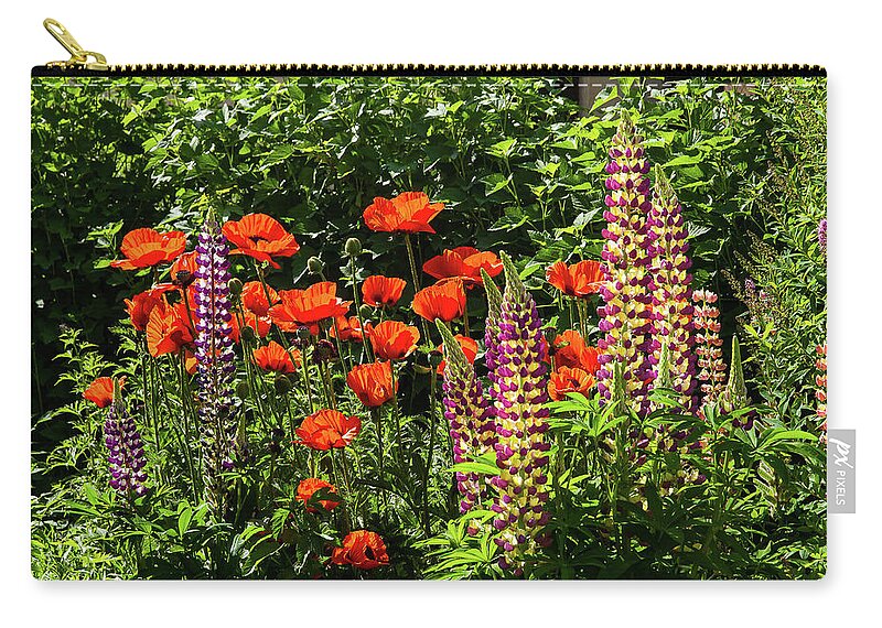 Flower Zip Pouch featuring the photograph Poppies and lupines by Paul MAURICE