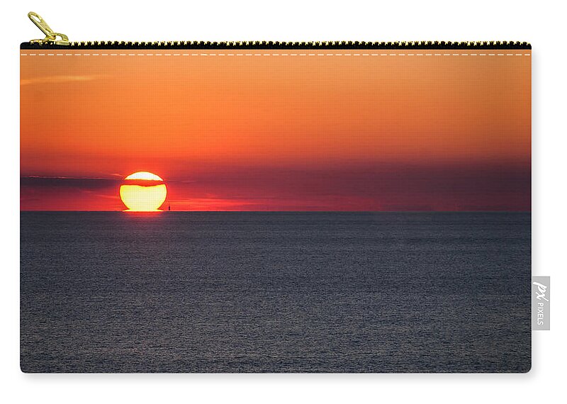 Sunset Zip Pouch featuring the photograph Pour Some Sunset by Charles McCleanon