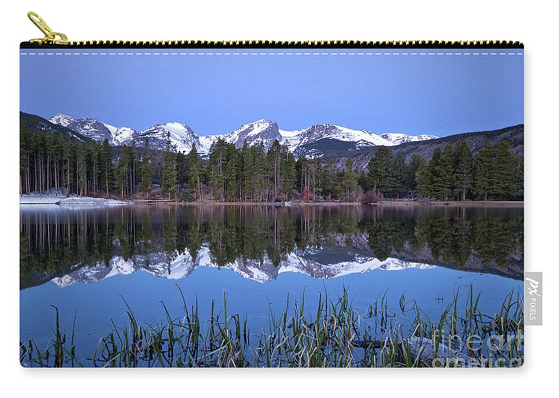 Sprague Lake Zip Pouch featuring the photograph Pre dawn image of the Continental Divide and a Sprague Lake refl by Ronda Kimbrow