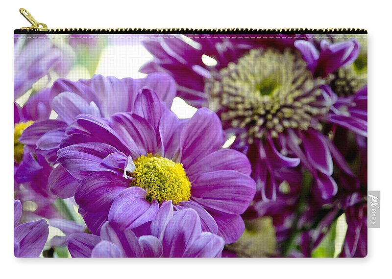 Gerbera Zip Pouch featuring the photograph Purple Flower in Cold Light. by Elena Perelman