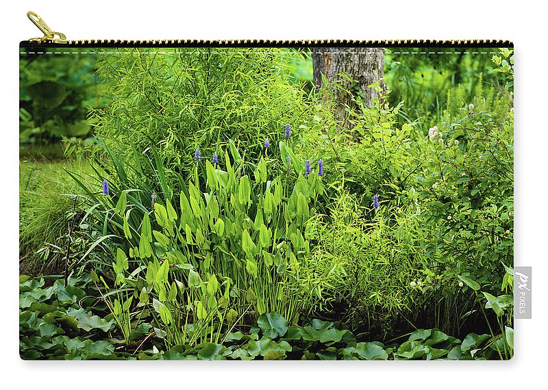 Bloom Zip Pouch featuring the photograph Purple Flowers by the Ponds Edge by Dennis Dame