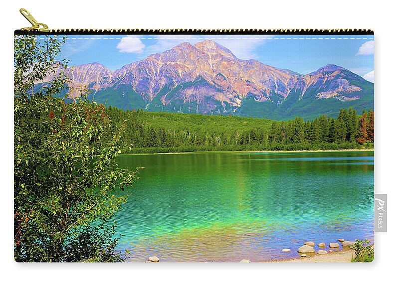 Pyramid Mountain Zip Pouch featuring the photograph Pyramid Mountain over Teal Waters by Polly Castor