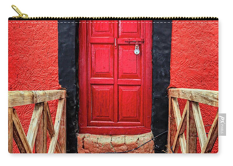 Asia Zip Pouch featuring the photograph Red door at a monastery by Alexey Stiop
