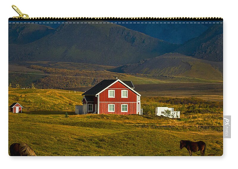 Horse Zip Pouch featuring the photograph Red House and Horses - Iceland by Stuart Litoff