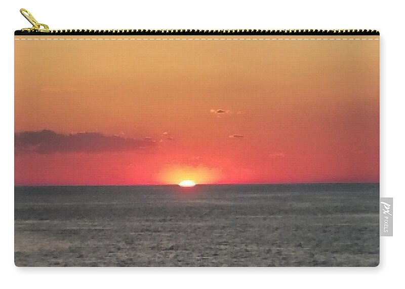 Sunset Zip Pouch featuring the photograph Red Sun Sets Over Ocean by Vic Ritchey
