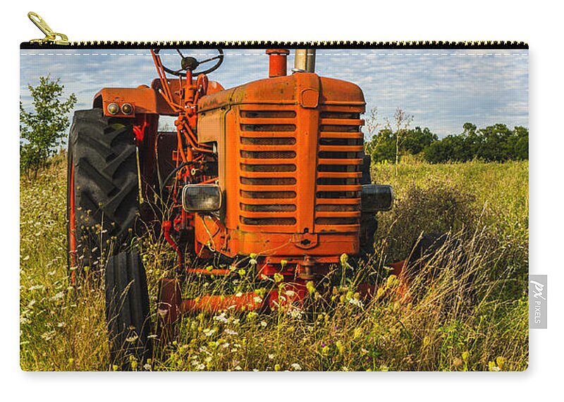 Tractor Zip Pouch featuring the photograph Red Tractor in a green Meadow. by John Paul Cullen