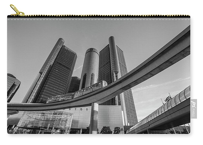 Detroit Zip Pouch featuring the photograph Renaissance center and people mover by John McGraw