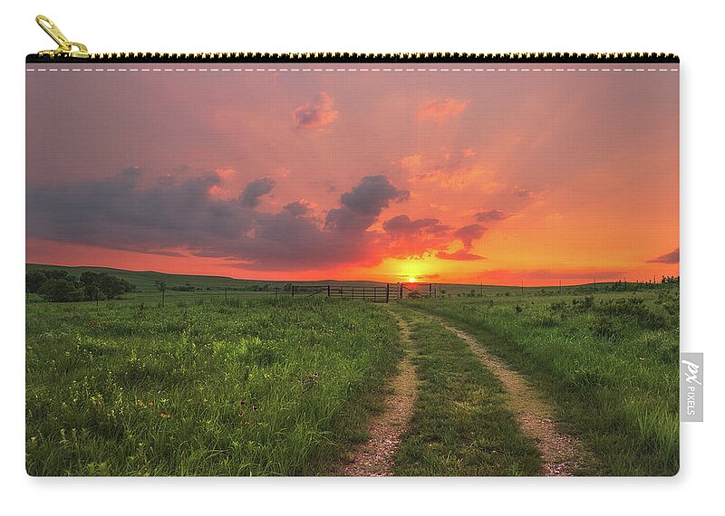 Kansas Zip Pouch featuring the photograph Ride off into the Sunset by Darren White