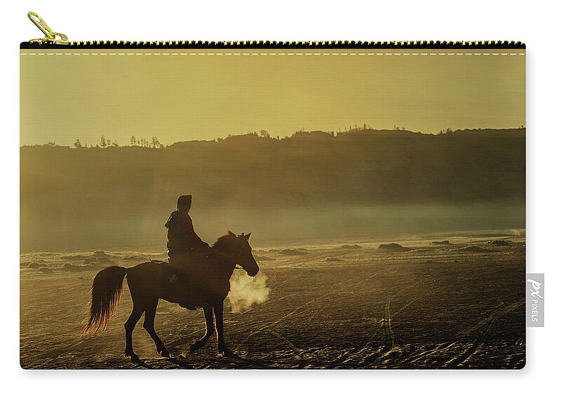 Landscape Zip Pouch featuring the photograph Riding his horse by Pradeep Raja Prints