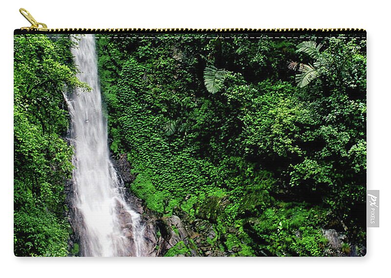 India Zip Pouch featuring the photograph Roadside waterfall in the mountains of Arunachal Pradesh, India by Misentropy