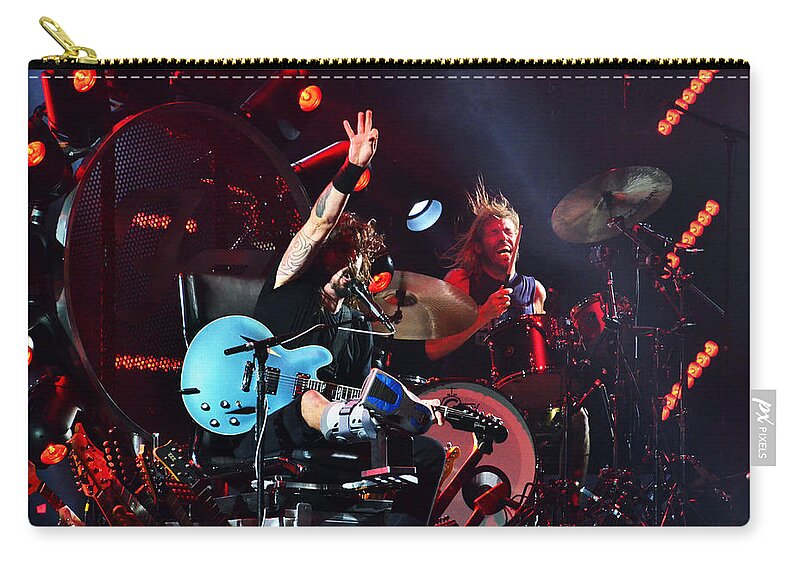 The Foo Fighters Zip Pouch featuring the photograph Rocking by La Dolce Vita