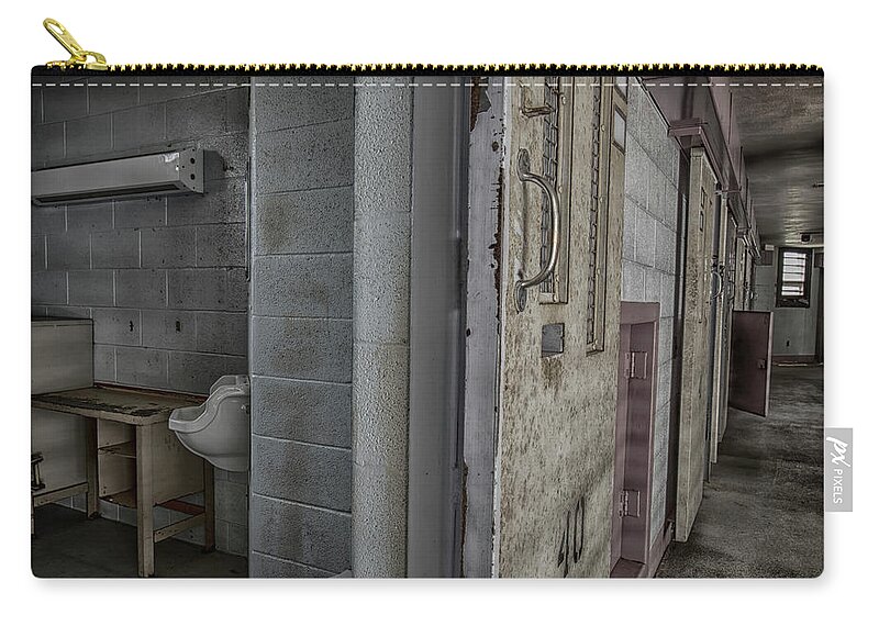 America Zip Pouch featuring the photograph Row of cells in prison by Karen Foley