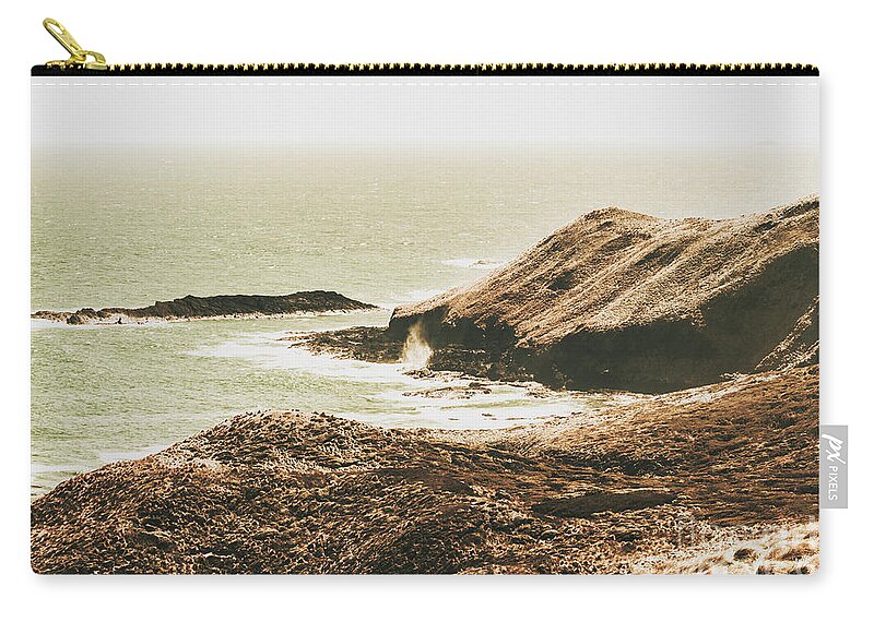 Vintage Zip Pouch featuring the photograph Rugged rocky cape by Jorgo Photography