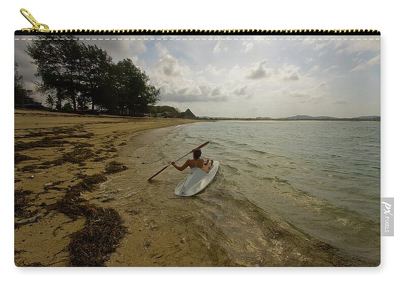 Boat Zip Pouch featuring the photograph Sailing To The Sea by Maria Marganingsih