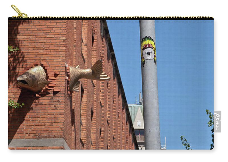 Urban Zip Pouch featuring the photograph Salmon through a building by Frank DiMarco