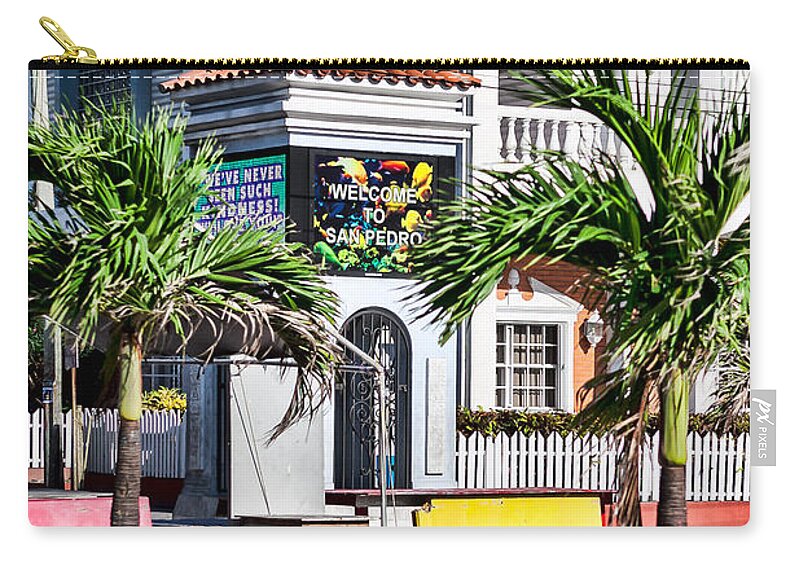 Ambergris Caye Zip Pouch featuring the photograph San Pedro Town Plaza by Lawrence Burry