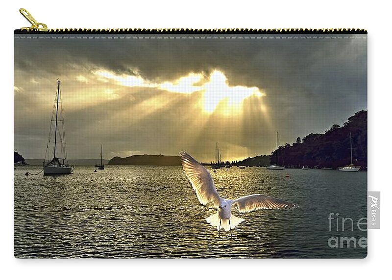 Seagul Zip Pouch featuring the photograph Seagull at Sunrise with Crepuscula Rays. by Geoff Childs
