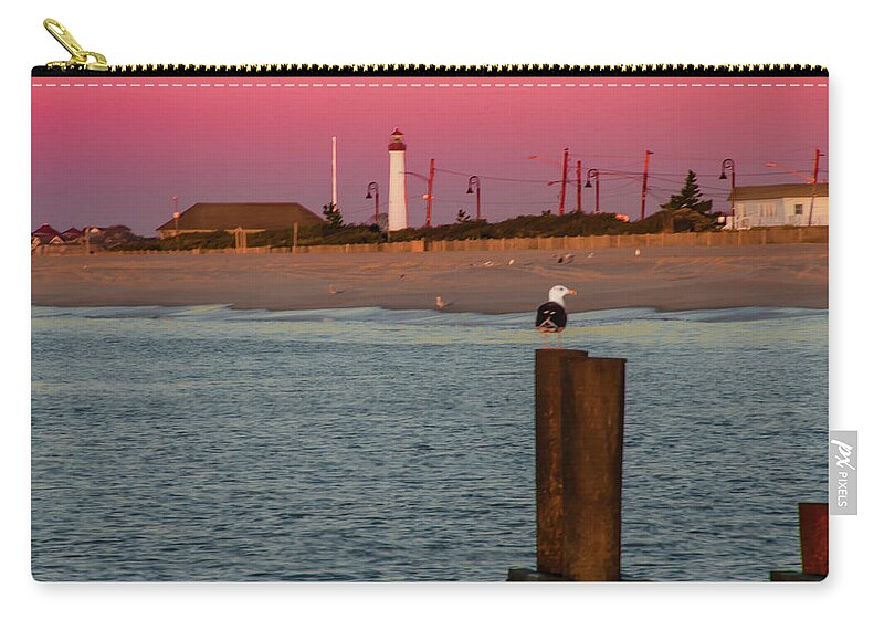 Seascape Zip Pouch featuring the photograph Seascape - The Lighthouse at Cape May by Bill Cannon