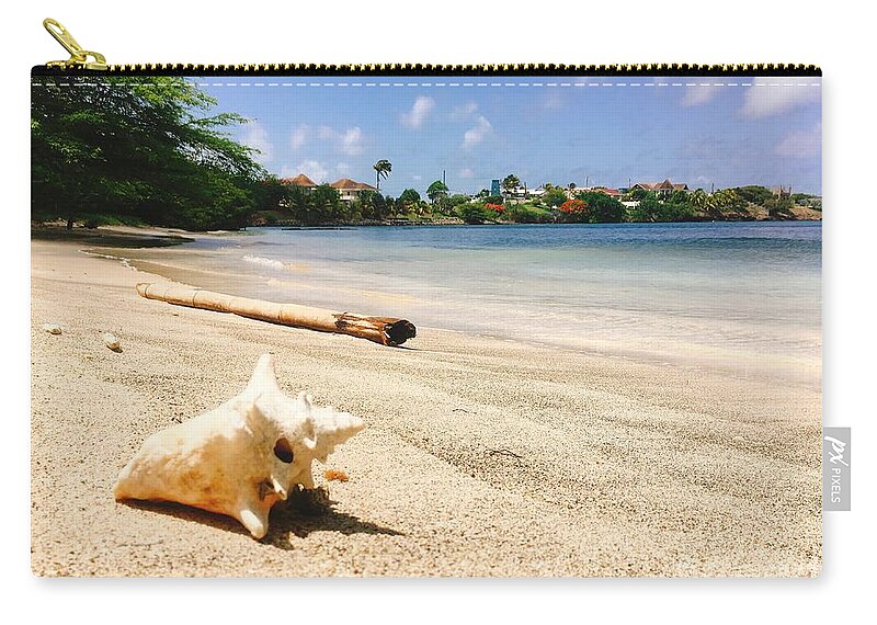 Seashell Zip Pouch featuring the photograph Seashell on beach by Laura Forde