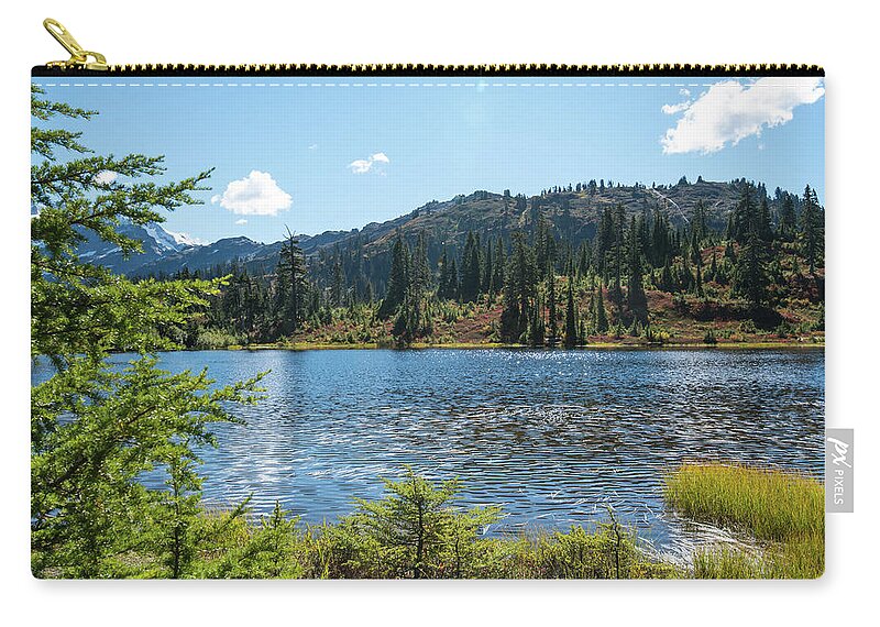 September Wrinkles On Picture Lake Zip Pouch featuring the photograph September Wrinkles on Picture Lake by Tom Cochran
