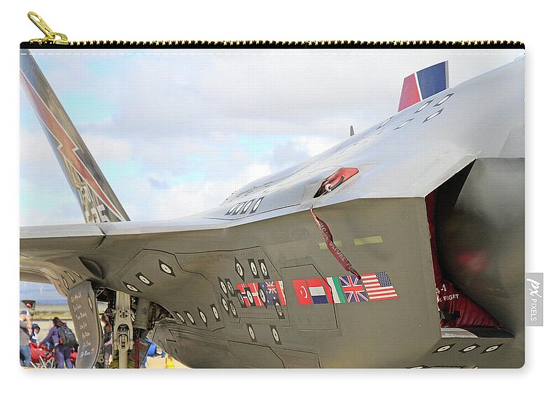 F-35 Zip Pouch featuring the photograph Side of the F-35 by Shoal Hollingsworth