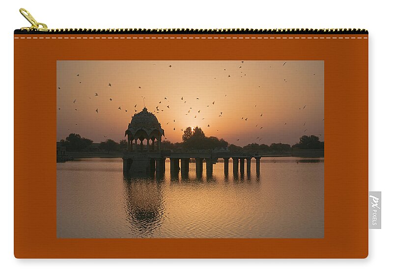 Sunrise Zip Pouch featuring the photograph SKN 1372 Sunrise Flight by Sunil Kapadia
