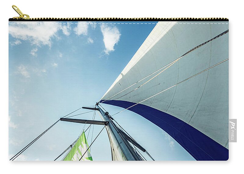 Aegis Carry-all Pouch featuring the photograph Sky Sailing by Hannes Cmarits